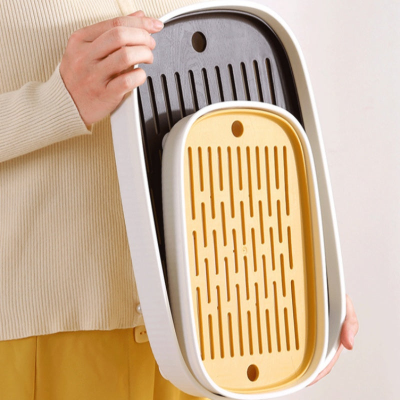 Grille du plateau de litière retirée à la main pour le nettoyage