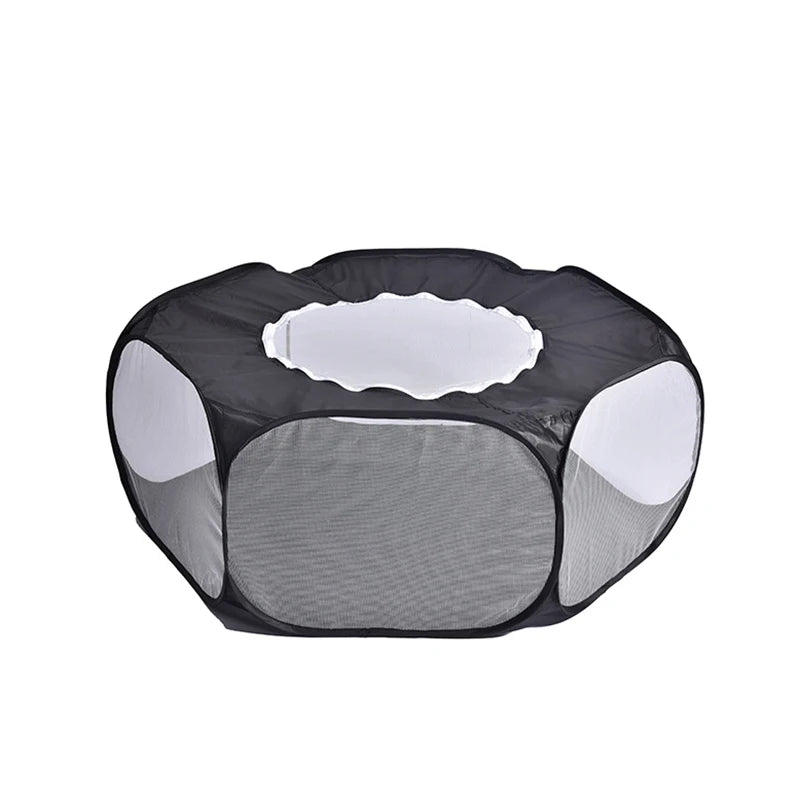 Parc pop-up hexagonal noir vu de trois quarts, ouverture supérieure ovale